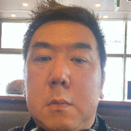 山口 賢造